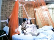 酒店偷拍刚下班的长裙美女和同事偷情,刚干完第2次男的好像接到老婆电话赶紧操